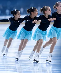 Team Elua skaters in black and turquoise dresses skating in a line